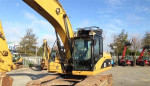 Caterpillar 320DL rypadlo bager – fotka 2